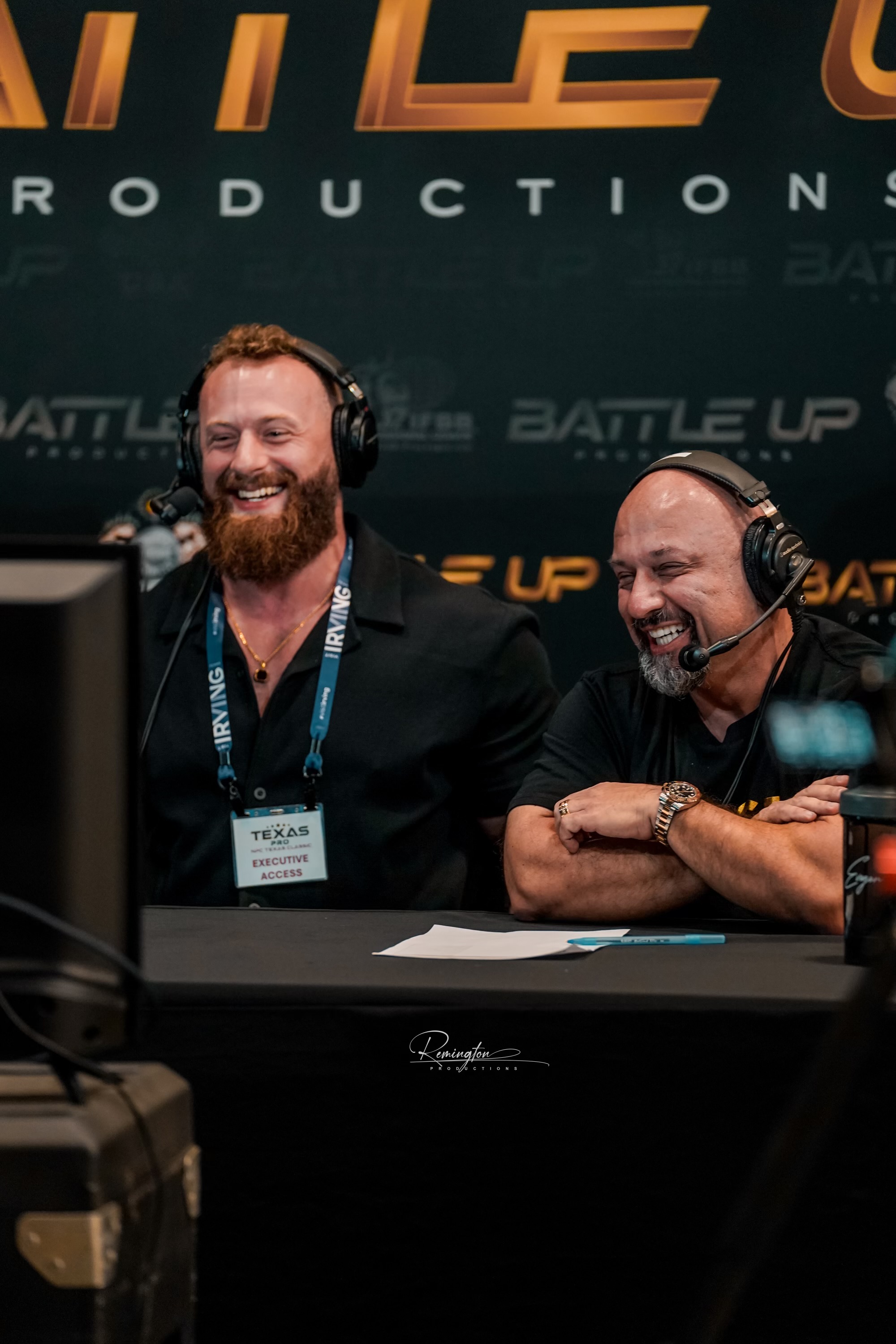 Justin Mihaly and colleague broadcasting live at a fitness industry event